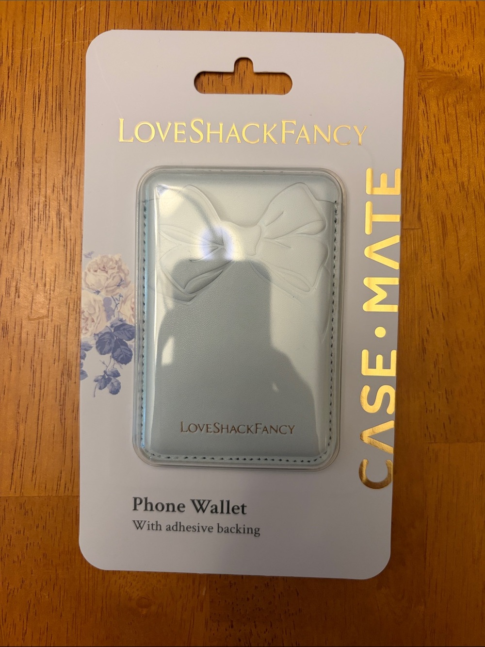 LoveShackFancy Pale Blue Phone Wallet with Embossed Bow